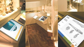 Interactive displays are set in a modern exhibition space, showcasing various artifacts and specimens. Touchscreens provide information about different marine fossils